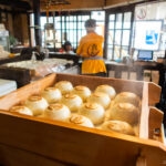 A box of food in a kitchen, reminiscent of the delicious food in Takayama.